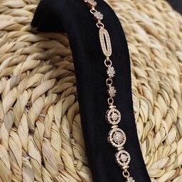 دستبند جواهری زنانه نگین دار مجلسی طلایی ، مشابه طلا و استیل رنگ ثابت