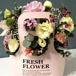 باکس گل زنبیلی صورتی تهیه شده از گل های با درجه کیفیت فوق ممتاز و ممتاز