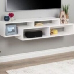 میز تلویزیون دیواری سفید در رنگبندی مختلف  دارای چهار قفسه ارسال  به صورت باربری با پس کرایه