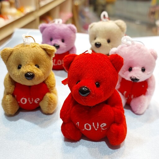 عروسک خرس  مخملی  ولنتاین در پنج رنگ قرمز ، صورتی ، کرم ، قهوه ای ، بنفش مناسب کادو ولنتاین و باکس های هدیه