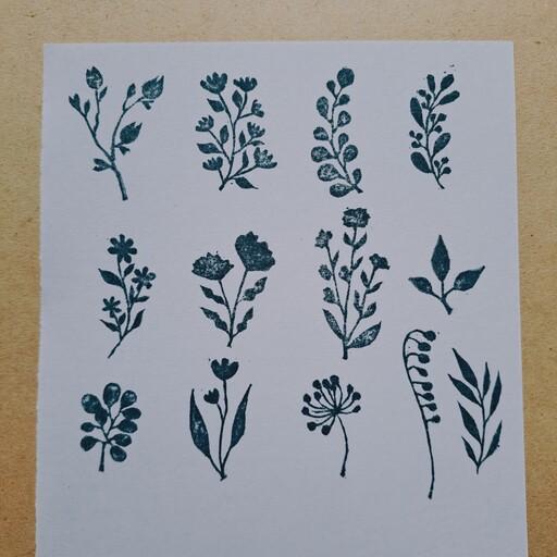 مهر دستساز گل و برگ در شکل های مختلف برای طراحی کاغذ کادو طراحی پارچه و بسته بندی