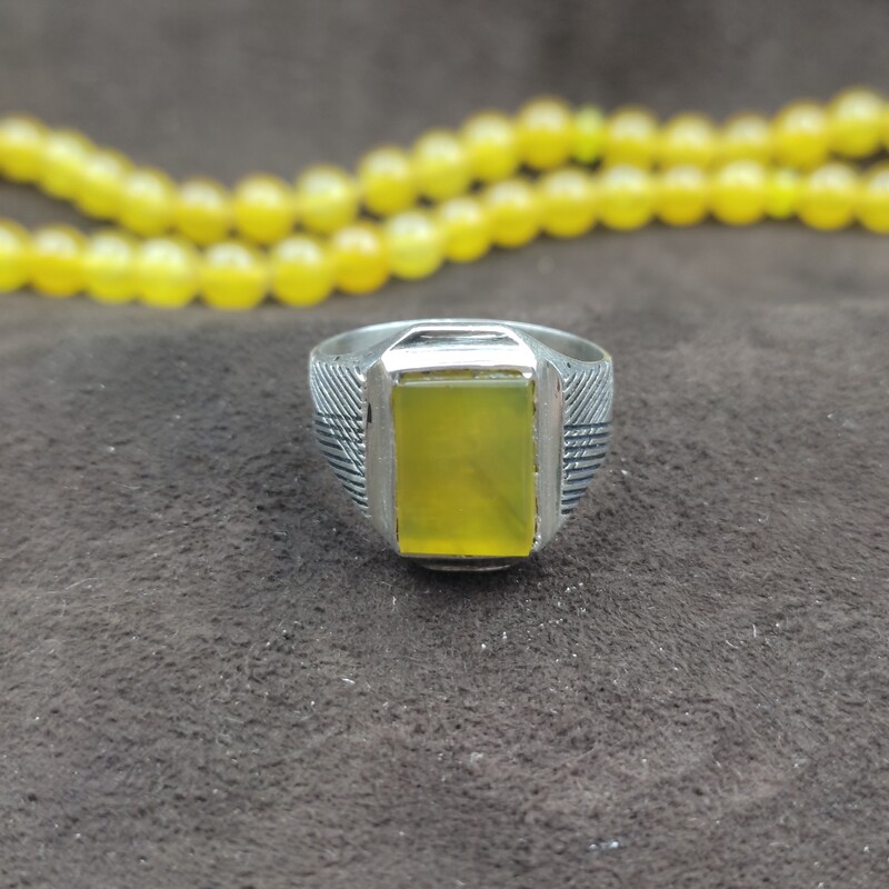 695-انگشتر نقره با سنگ عقیق زرد (همراه با دعای شرف الشمس )با حرز امام جواد - w6.75