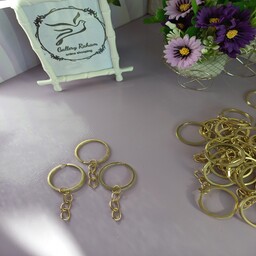 حلقه جا کلیدی تخت طلایی به همراه زنجیر قطر سه سانت