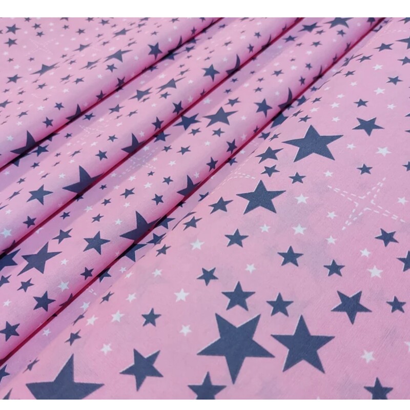  پارچه ملحفه ای تترون طرح ستاره زمینه صورتی عرض دو متر پارچه ملافه ای تافته طرح شب زمینه صورتی     