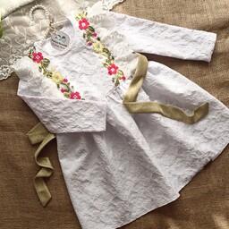 پیراهن دخترانه عید  مجلسی لباس بچگانه عیدانه ژاکارد سفید سوزندوزی 