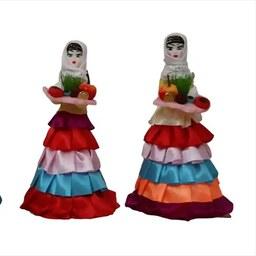 سفره هفت سین  عروسک زن محلی، نمادی از اصالت ایرانی در عید نوروز 