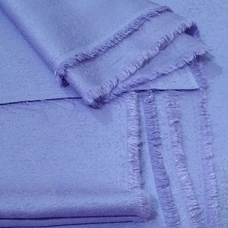 پارچه کتان لمه درجه یک رنگ بنفش یاسی(قیمت درج شده برای قواره3مترهست)