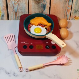 ست بازی دخترانه آشپزخانه ماهی تابه و گاز صفحه ای باتری خور و صدادار و چراغ دار همراه با تخم مرغ