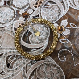 دستبند آویز دار سواروسکی طلایی استیل رنگ ثابت