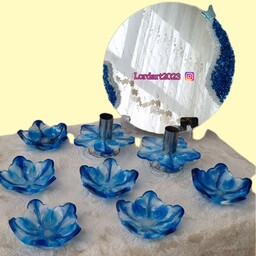 هفت سین رزینی زیبای مدل گل سه بعدی آبی رنگ 10 تکه.6پیاله.2شمعدان پایه شیپوری.یک آینه باقطر30سانتیمترو یک پایه آینه