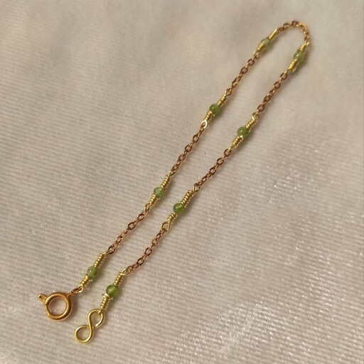 دستبند زنانه طلایی زنجیری سنگ سبز جید استیل