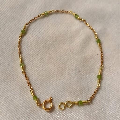 دستبند زنانه طلایی زنجیری سنگ سبز جید استیل
