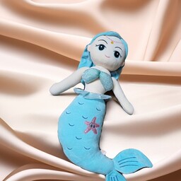 عروسک پری دریایی آبی رنگ.