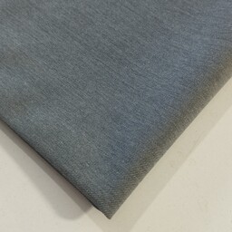 پارچه فاستونی درجه ی عرض 150 تک رنگ رنگ طوسی قیمت به ازای نیم متر 