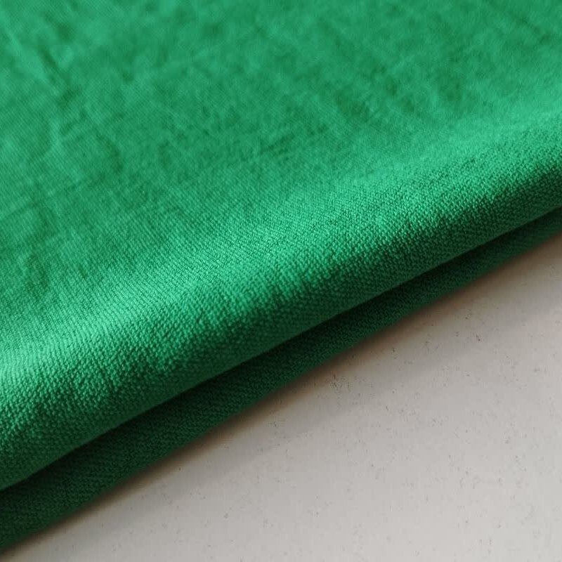 پارچه کرپ ابروبادی جنس خوب گرم بالا عرض 150 تک رنگ رنگ سبز سیدی قیمت به ازای نیم متر 