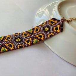 دستبند پهن زنانه منجوق بافی طرح سنتی رنگ ثابت