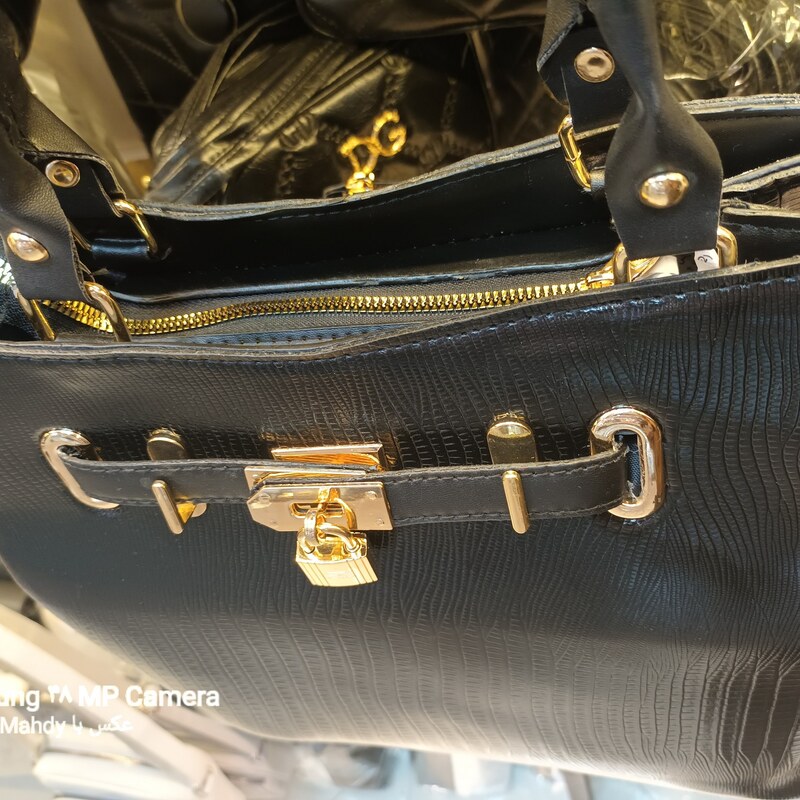 کیف چرم زنانه چند تیکه قفلی