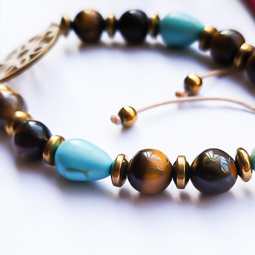دستبند لنا ساخته شده با سنگ چشم ببر، فیروزه و هماتیت اصل همراه با پلاک اسلیمی طلایی رنگ ثابت مناسب برای هدیه و فری سایز
