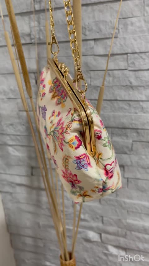 کیف دهانه فلزی گلدار