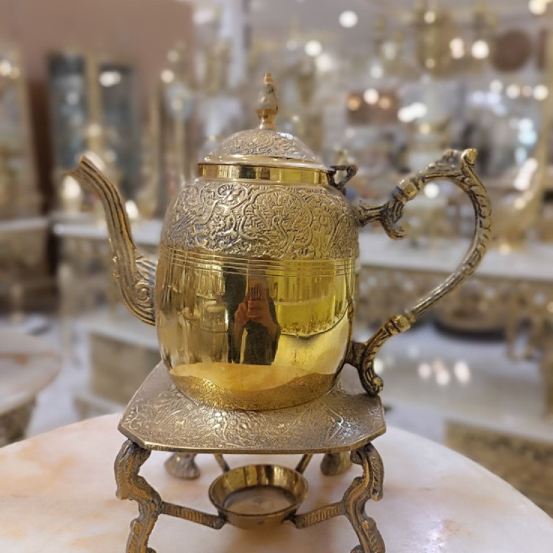 قوری طرح طاووس وارمردار چهارپایه برنجی