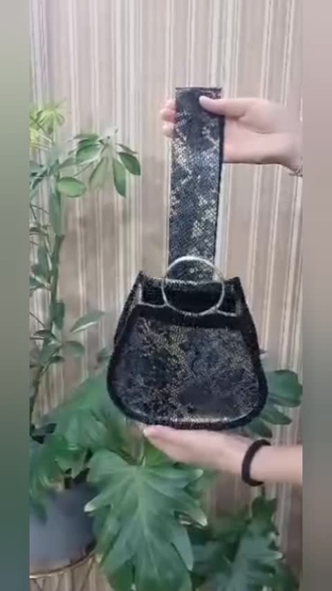 کیف زنانه دستی پوست ماری حلقه ای