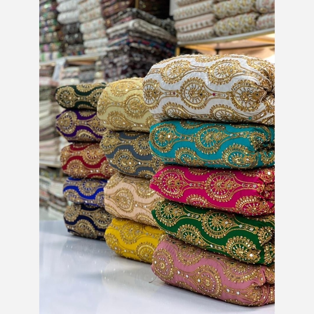 پارچه ساتن سوزن دوزی فاخر خورشیدی مناسب خرجکار ومانتو کتی وکفتان قیمت برای نیم متر 