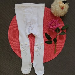 جوراب شلواری دخترانه سفید طرح شکوفه بهاری در 6 سایز  ومناسب برای 2سال تا 7 سال 