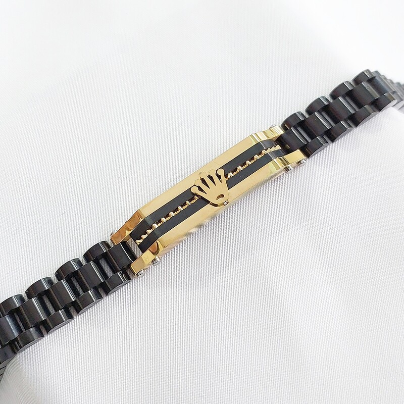 دستبند رولکس مردانه استیل مشکی با پلاک طلایی دو رنگ
