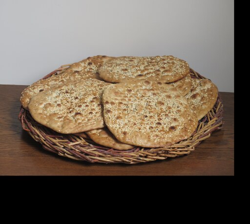نان فتیر سنتی و محلی پر کنجد سوغات اراک (روستای ساروق )1کیلویی 