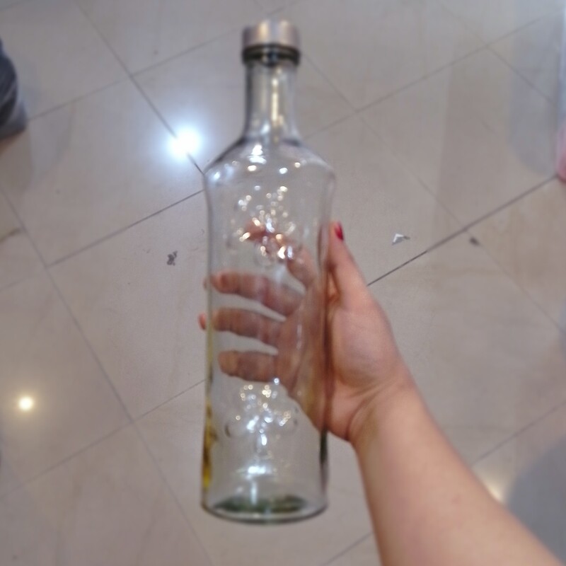 بطری آب گرد درب استیل طاها یا بطری آب شیشه ای در حراجی پلاسکو 
