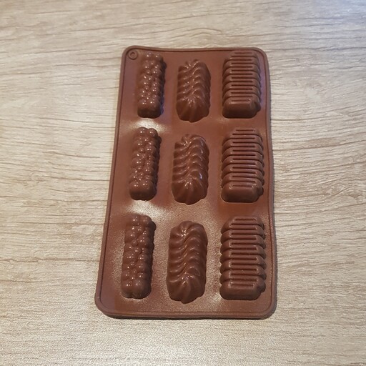 قالب شکلات و ..سیلیکونی طرح مستطیل ابعاد کلی 10 در 20،ابعاد کوچک 5 در 2