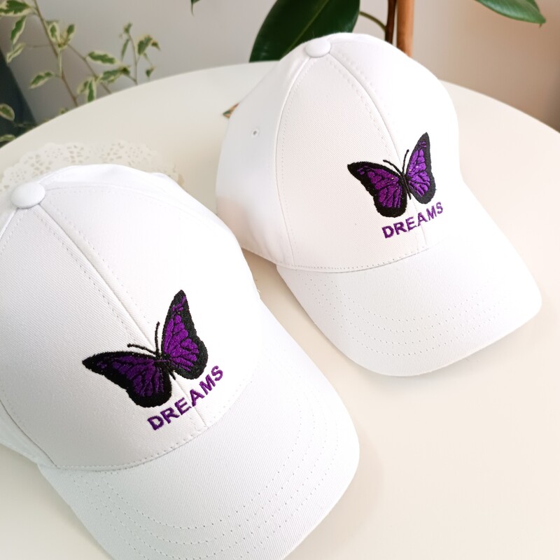 کلاه کتان نقابدار گلدوزی وارداتی  طرح پروانه کیفیت اعلا منفذ خنک کننده تنظیم سایز مناسب 10 سال به بالا تا 100 سال 