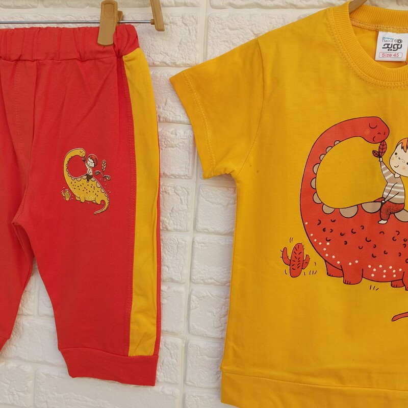 لباس بچگانه ست تیشرت شلوارک پسرانه از سایز 40 تا 50 دایناسور نارنجی