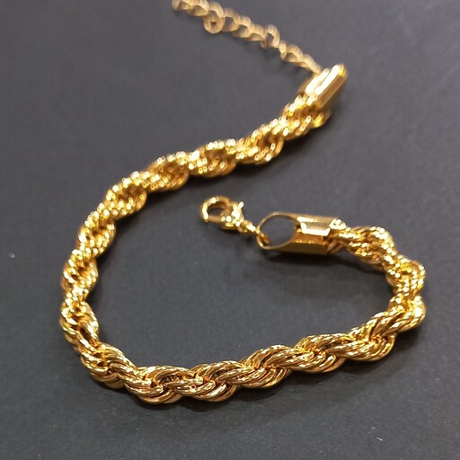 دستبند زنانه طلایی بافت طنابی