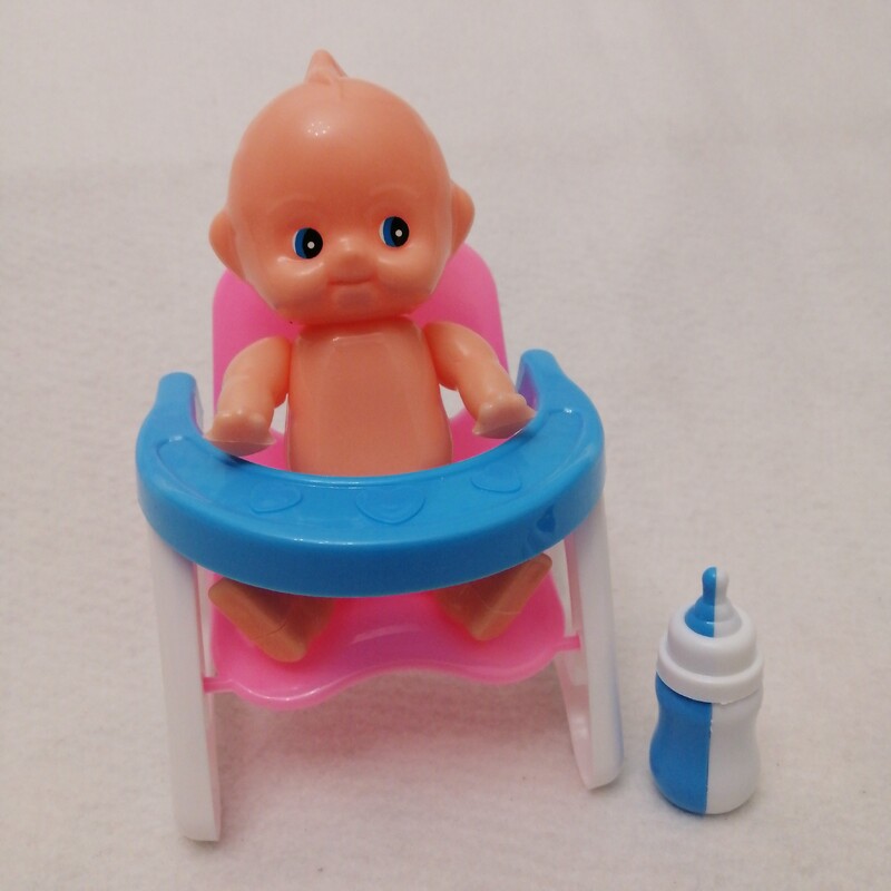 عروسک نوزاد مفصلی بهمراه صندلی کودک و شیشه شیر 