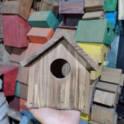 کلبه ی چوبی پرنده 