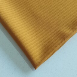 پارچه حریر میله ای درجه ی یک عرض 150 تک رنگ رنگ خردلی قیمت به 10 سانت