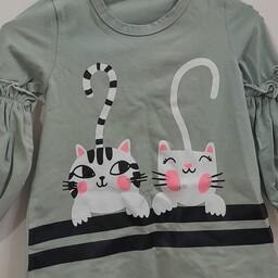 پیراهن دخترانه چاپ دو گربه رنگ سبز سدری استین طرح دار وزن  140 گرم 