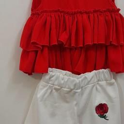 پیراهن دخترانه  باشلوارک رنگ پیراهن قرمز  و رنگ شلوارک سفید وزن 200 گرم 