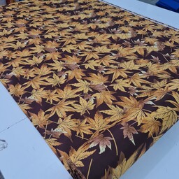 پارچه متری ملافه ای خارجی رنگ ثابت تضمینی عرض 240 سانت  لطیف طرح  برگ پاییزی عرض دو متر و چهل سانت