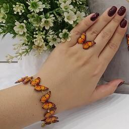 دستبند و انگشتر پنج پروانه نارنجی .اتصالات دستبند رنگ ثابت و انگشتر کیفیت معمولی