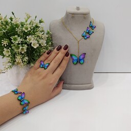 ست سه تیکه پروانه آبی بنفش شامل گردنبند و دستبند رنگ ثابت و انگشتر کیفیت معمولی 