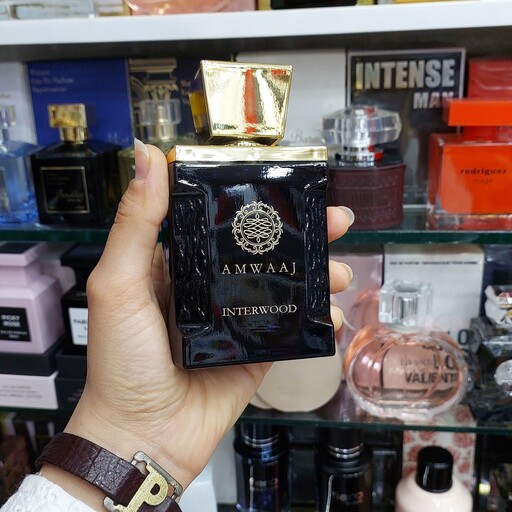 عطر ادکلن امواج اینتر وود اینتر لود مردانه اورجینال فرگرنس 100 میل Amwaag inter wood Fragrance world