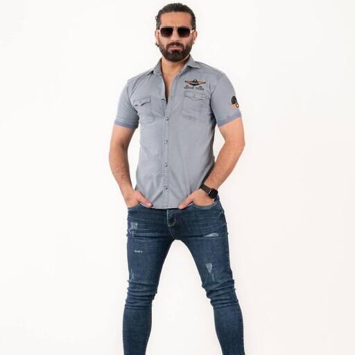 پیراهن جین آستین کوتاه مردانه، رنگی 2 جیب گلدوزی شده آستین کشی بدون آبرفت تضمینی از سایز M تا 3XL