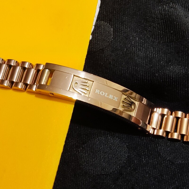 دستبند رولکس رزگلد پلاک دار برند اصلی استیل رنگ ثابت