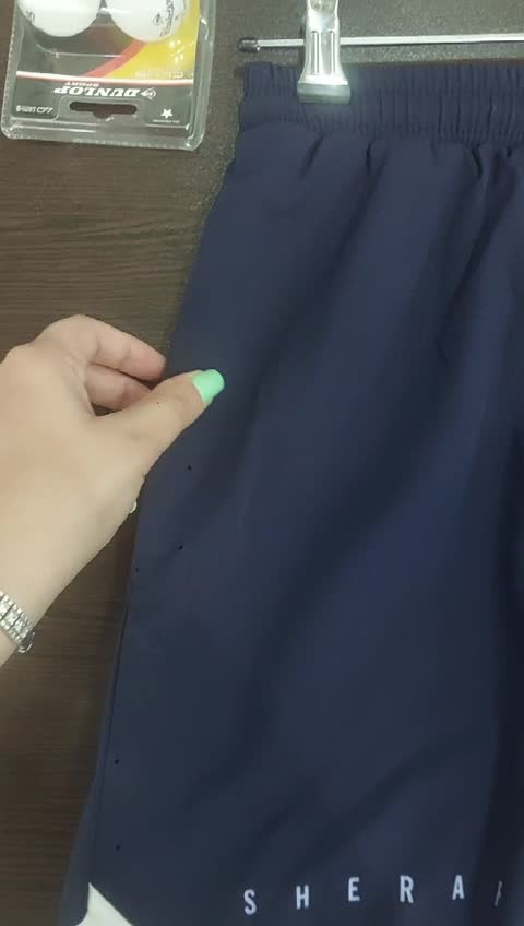 حراج شلوارک ورزشی اکشن شرافیت سرمه ای