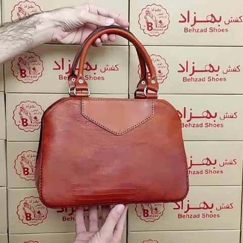 کیف دستی تمام چرم طبیعی گاوی درجه یک زنانه دخترانه رنگ عسلی دوخت ماشینی  تک خانه کیفیت عالی 