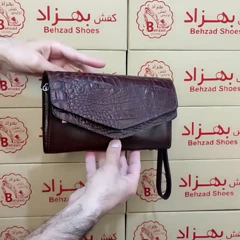 کیف بند دستی تمام چرم طبیعی گاوی زنانه رنگ قهوه ای دوخت ماشینی داخل کیف دو خانه جای موبایل و کیف پول کیفیت  عالی