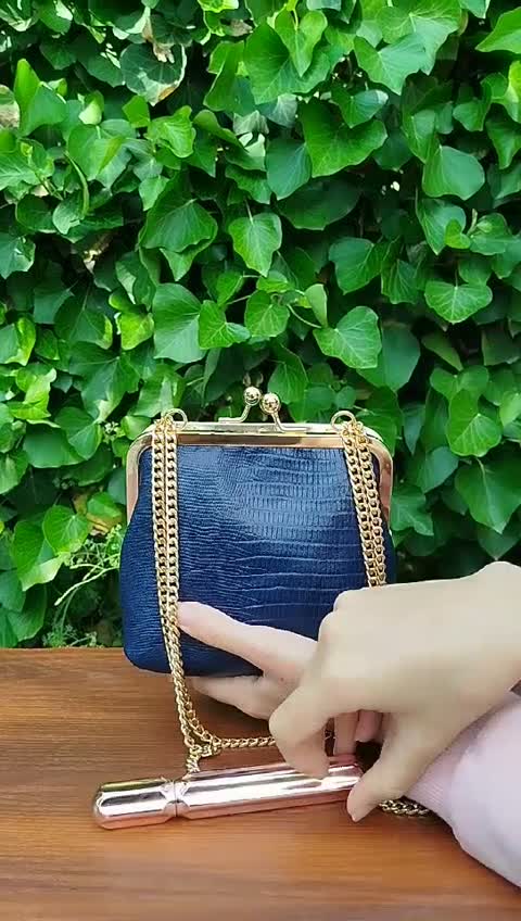 کیف دهانه فلزی چرم طبیعی دست دوز