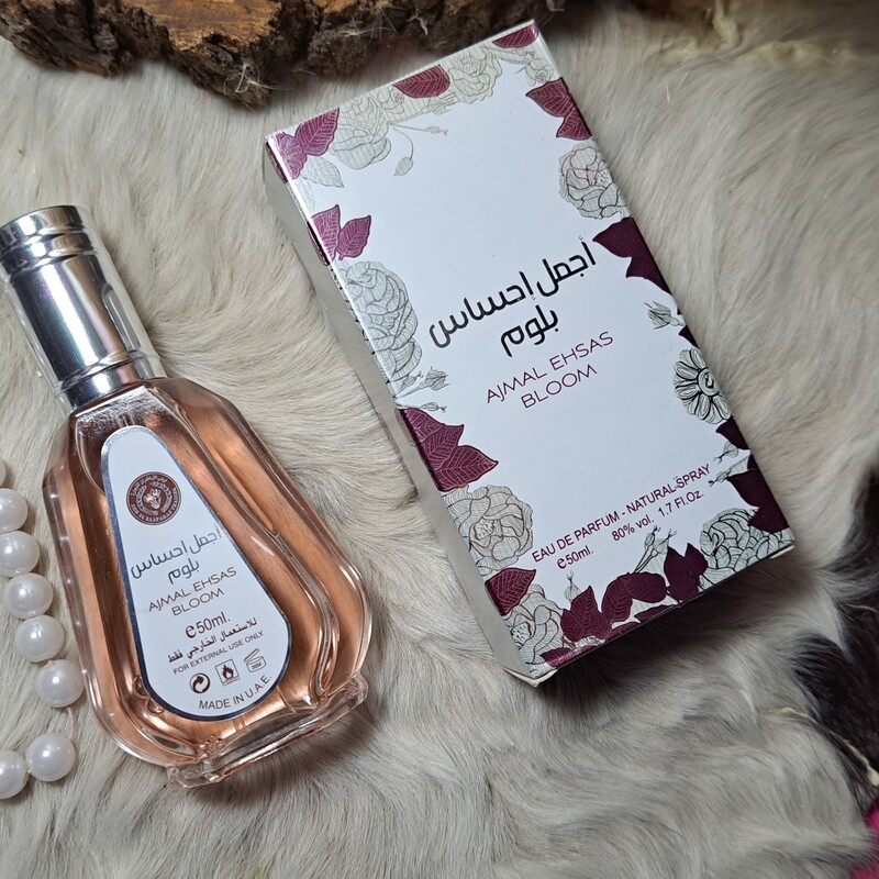 ادکلن اجمل احساس بلوم Ajmal Ehsas Bloom متعلق به برند معروف عربی ارض الزعفران و از محصولات وارداتی از امارات متحده ی عرب